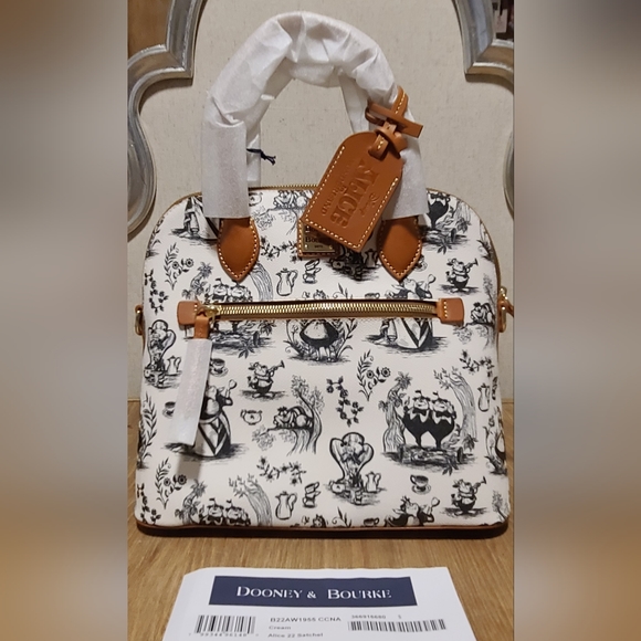 Dooney & Bourke Handbags - Dooney and Bourke Disney Alice 22 Satchel